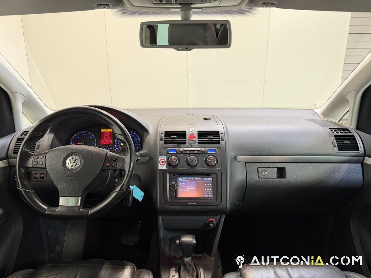 Volkswagen Touran — foto 26
