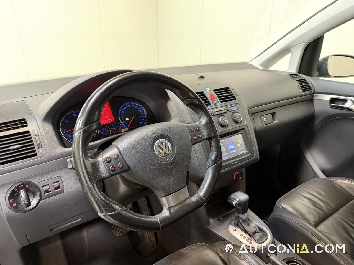 Volkswagen Touran — foto 22