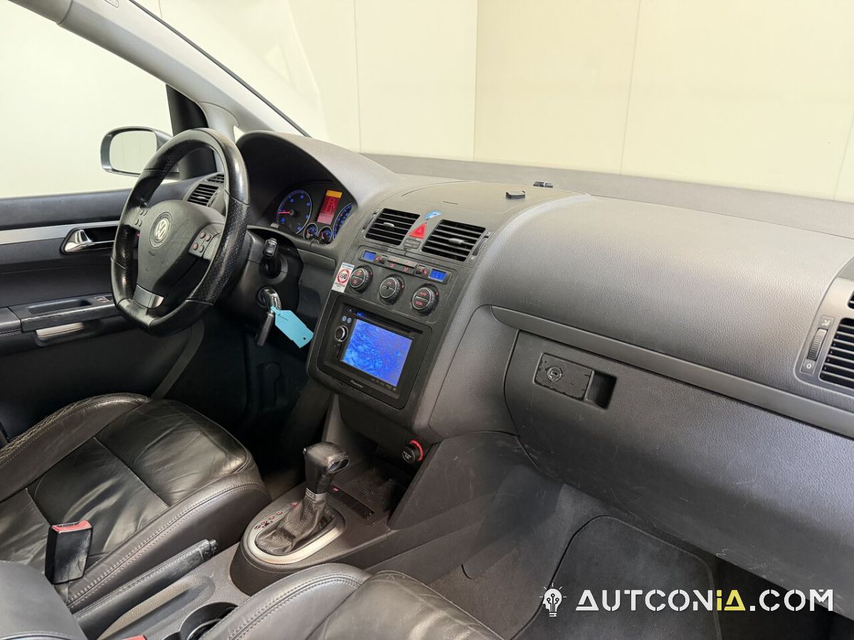 Volkswagen Touran — foto 27